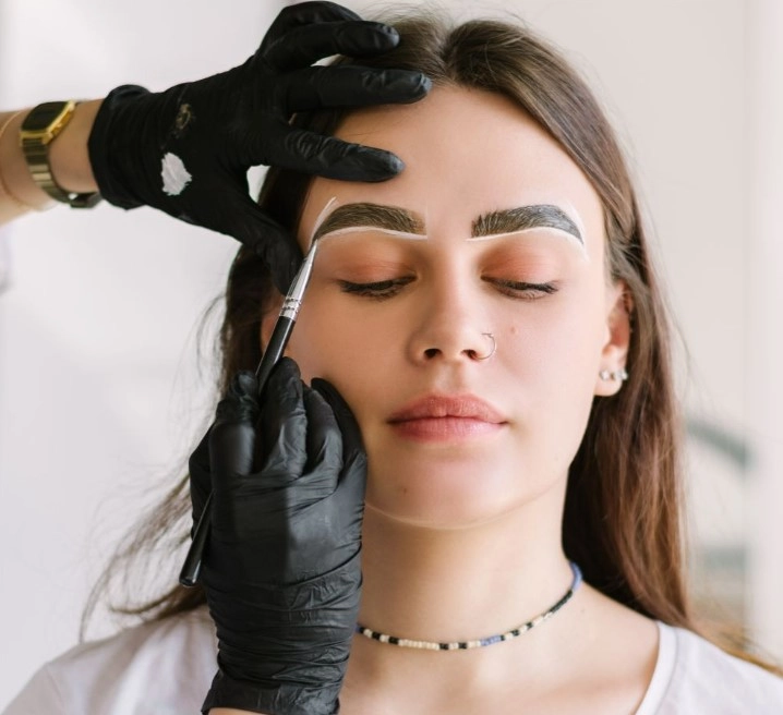 Eyebrow tinting salon procedure in progress at Brooklyn Brows NYC