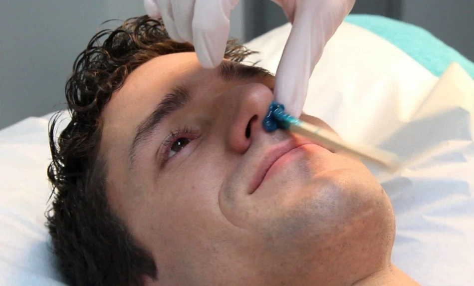 Male nose waxing hair removal treatment at Brooklyn salon