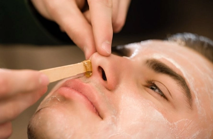 Hygienic upper lip waxing using a sterile wooden spatula