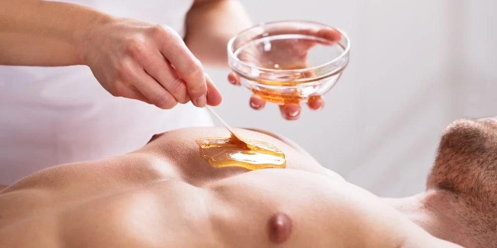 Men grooming services in Brooklyn including eyebrow threading, waxing, and facial treatments.